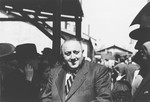 Albert Nussbaum, Director of Transmigration for the American Joint Distribution Committee, poses in the port of Lisbon where Jewish refugees wait to board the SS Mouzinho.