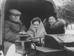 Basia Berkowicz rides in a carriage with her mother and another relative in Otwock, Poland.