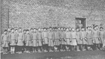 Girls are assembled for roll call at the Jugendschutzlager Litzmannstadt, a concentration camp for Polish juveniles.