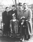 Jankiel Garbasz (top row, second from the left) poses with his aunt, uncles and cousins shortly before he left Poland for Australia.