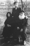 Jankiel Garbasz poses with his grandparents, Israel and Sara Garbasz, shortly before he left Poland for Australia.