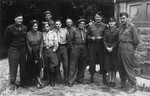 Group portrait of the first UNRRA medical team to arrive at Ohrdruf.