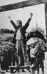 Standing beneath the gallows where he will be hanged momentarily, Stjepan Filipovic, commander of the Tomnasko-Kolubarski partisan detachment, calls upon the people of Serbia to fight the "traitors of the Serbian people".