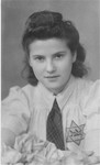 Portrait of a young Jewish woman wearing the yellow star in the Modrzejow ghetto.