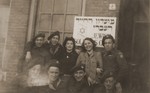 Group portrait of members of the Jewish Brigade in front of the Jewish soldiers' club in Eindhoven, Holland.