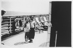 Two young children stand on deck of the MS St. Louis.