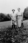Bertha and Susanne Strauss pose outside in a field near their home in Vacha, Germany.