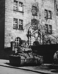 A tank guards the entrance to the Palace of Justice in Nuremberg, where the International Military Tribunal trial of war criminals was held.