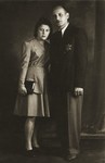 Studio portrait of Herz Heller and his wife taken in the Bedzin ghetto.