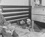 Survivors in the infirmary barracks for Jewish prisoners in the Ebensee concentration camp.