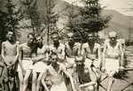 Group portrait of Ebensee survivors after having showered in the portable shower units installed in the camp by personnel of the 30th U.S.