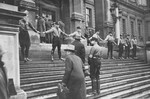 A group of SA hold hands on the steps of the University of Vienna in an attempt to prevent Jews from entering the building.