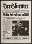 Front page of the Nazi publication, Der Stuermer, with an anti-Semitic caricature of Herschel Grynszpan, the Jewish assassin of Ernst vom Roth.