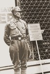 An SA member stands guard at the entrance to a Jewish-owned store during the April 1, 1933 boycott.
