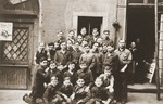 Group portrait of Jewish youth in the keymaker's course at the Juedische Anlehrnwerkstatt [Jewish vocational training school].