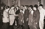 Adolf Hitler greets members of the Arbeiterjugend (Youth Workers) in the Reich chancellery.