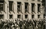 A delegation from the Saar region salutes Hitler from the street in front of the chancellery building.