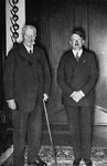 Reich President Paul von Hindenburg poses with Reich Chancellor Adolf Hitler.