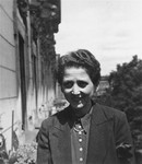 Portrait of Lydia (Wolffberg) Ellgass outside her apartment located on Klopstockstrasse 18 in Berlin.
