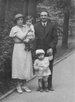 Portrait of Naftali and Rosa Krauthamer with their two children, Zigmund and Julius, in Hanover, Germany.