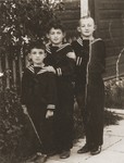 Three Jewish brothers pose in sailor suits.

Pictured from right to left are; Zvi Hirsch; Joseph and Ephraim Harmatz.