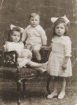 Studio portrait of the three oldest children of Louis and Ida Meijer.