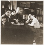 Amos and Binyamin Rabinovitch playing chess in the family house on Gedimino Street.
