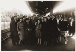 The Virovitch family gathers at the Kovno train station to bid farewell to Abrasha Virovitch who was immigrating to Palestine.