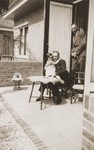 Suse Grunbaum on the lap of Bennie Pagrach, her aunt Bertha's brother.