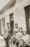 A group of Jewish cousins pose outside the home of Louis Meijer in Boekelo.