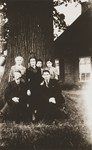 Members of the Zion family pose with one of the Dutch farming families that hid them during the Holocaust.