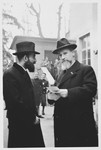 Two rabbis hold a conversation outside the Breuer Yeshiva in Frankfurt.