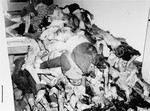 Corpses piled in the crematorium mortuary.  These rooms became so filled with bodies that the SS staff and survivors began to pile corpses behind the crematorium, where they were found by U.S.