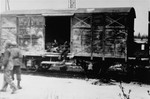 American soldiers view one of the railcars of the Dachau death train.