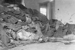 Corpses piled in the crematorium mortuary.  These rooms became so full of bodies that the SS staff and survivors began piling corpses behind the crematorium, where they were found by U.S.
