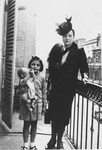 Brenda Hershkovitz poses with her doll and her mother, Rosette, on the balcony of the family's apartment, shortly before the start of World War II.