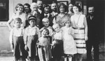 Group portrait of the extended Frisch and Genendlen family taken on the occasion of a visit by cousins in America.
