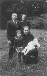 Feige Silberman (center) poses with her daughter Lea's family in Telsiai, Lithuania.