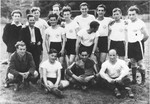 Auschwitz survivors, originally from Sighet, gather for a soccer game in a German DP camp.