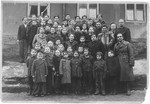 Children and teachers in the Tarbut school in the Rochelle displaced persons' camp.