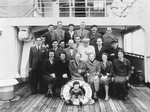 Group portrait of Jewish refugees on the deck of a Japanese ship while en route to the United States.