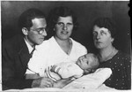 Portrait of Oskar and Berta Fiedler with their infant son, Harry.
