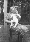 Blimcia (nee Stapler) Rauchwerger holds her baby son Aizek two years before they both perished in Auschwitz.