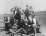 Jewish youth on an outing in Czernowitz.  

Among those pictured are Jascha Stein (center), Jacob Flexor (bottom right), and Moshe Kasner (top right).
