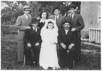 Members of the Klein family pose at the wedding of Rita Klein and Morris Weinstein in the Bad Gastein displaced persons camp.