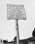 A sign on the road to the Natzweiler-Struthof concentration camp warning that the camp is in the area and that those who approach it will be shot without warning.