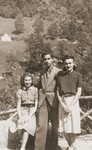 Leo Bretholz poses with Netty and Anny Frajermauer in the village of Cauterets.