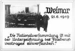 Propaganda slide entitled "Weimar/ 21.6.1919/The National Assembly is in agreement with the signing of the Peace Treaty."

Pictured in the center of the slide are Friedrich Ebert (left), first President of the German Republic, and Philipp Scheidemann (right), Chancellor and head of the "Weimar Coalition" of Social Democratic, Center and Democratic parties.