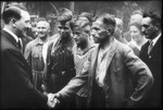 Adolf Hitler greets the German public.