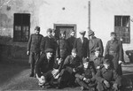 Group portrait of former Jewish soldiers now conscripted into a Hungarian forced labor battalion.